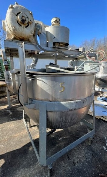 used 250 Gallon Lee Jacketed Mix Kettle.  Has sweep with scrapers. Unable to read motor nameplate. Jacketed rated 90 PSI @ 332 Deg. F. Height from floor to top lip is 56