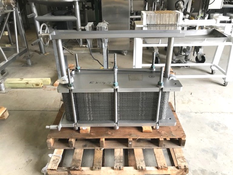 ***SOLD*** used Mueller 250 Sq.Ft. Sanitary Plate Heat Exchanger, Model AT20SS F-10. S/N 223807 Rated 100 PSI @ 150 Deg.F.  1-Section with Aprox. (82) 1' x 3' Stainless Steel Plates. Sq.Ft. is approximate.  3