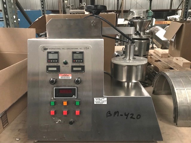 used Key International Bench Top High Shear Granulator Mixer Model KG-5. S/N: JI-3728. Comes with 2 choppers, (2) 1 Liter bowls and (1) 3 Liter Bowl. Last used in Pharmaceutical application. 