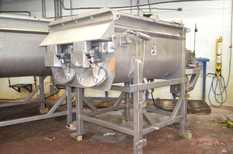 ***SOLD*** used 3000 Lb. MTC Stainless Steel Twin shaft Ribbon mixer last used for meat. MTC model MTB-28-030-R. 3,000 lb (Approx 95 Cu Ft) Capacity Stainless Steel Twin Shaft Ribbon Blender. Approx. 72 in x 57 in x 40in Deep, 15 hp Drive Motors into gear reducer to 30 RPM output. s/n: 10243. Drawings and manual on File. Last used in sanitary food plant. 