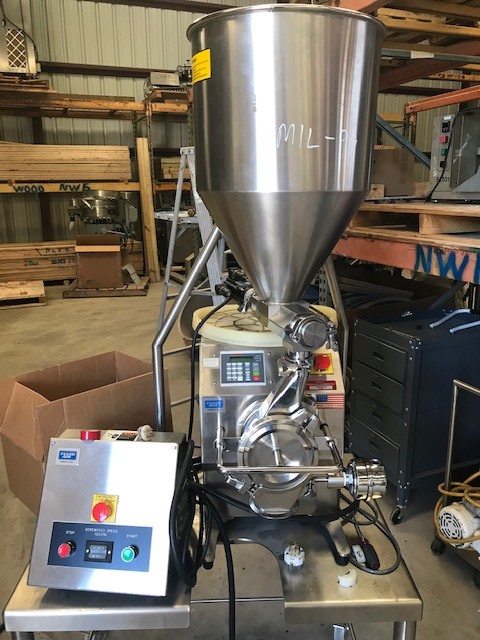 ***SOLD*** used Fluid Air Granumill Jr. with Screw Feeder. 120 Volt Single Phase for screw.  Mill is 1 phase 240 volt.  Rated throughput 0.1-25 KG/HR.  Last used in Sanitary Pharmaceutical plant.