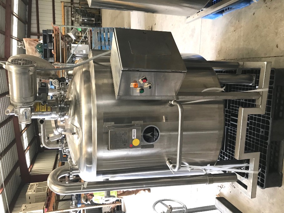 ***SOLD**** used 1000 Liter (264 Gal.) Stainless Steel Sanitary Pharmaceutical Grade Reactor. Jacketed Mixing Tank. Rated 40/Full Vacuum @ 300 Deg.F..  Jacket rated 100 PSI @ 300 Deg.F.. Bottom Discharge, Agitator  Lightnin SR5S50 Agitator with Stainless Steel 1/2 HP Motor 208-230/460V. Built by Apache Stainless Equipment. (2) top mounted spray balls.  Mounted on Stainless Steel Frame. SN# S/N 10938-1-2.  Overall Dimensions: Approx. 80