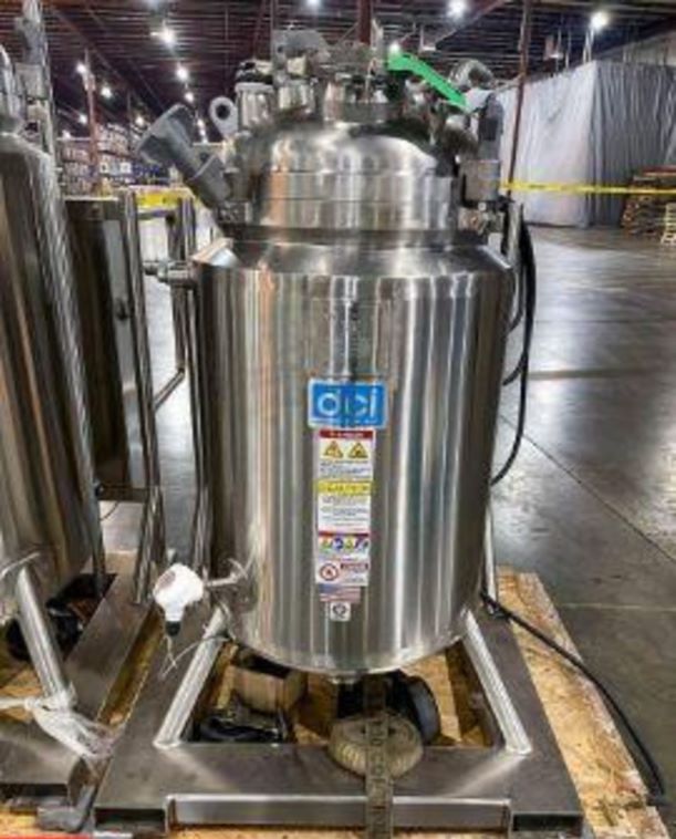 UNUSED DCI 150 Liter (40 Gallon) Sanitary Reactor/Fermenter with Top mounted Agitation. Internal Rated 45/Full Vacuum PSI @ 225 Deg.F..  Jacket rated 150/FV @ 225 Deg.F.. Mounted on Skid with Control Panel. NB# 1122_. S/N JS7104