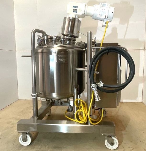 40 Gallon (150 Liter) Electrically Heated Sanitary Reactor with Mixer. Vessel rated 60/Vacuum PSI @ 302 Deg.F.. Jacket is electrically heated with controls.  Includes 1/2 HP top mounted Mixer Motor with 330 RPM output shaft. Built by DCI. S/N JS2354A. 316 S/S.

