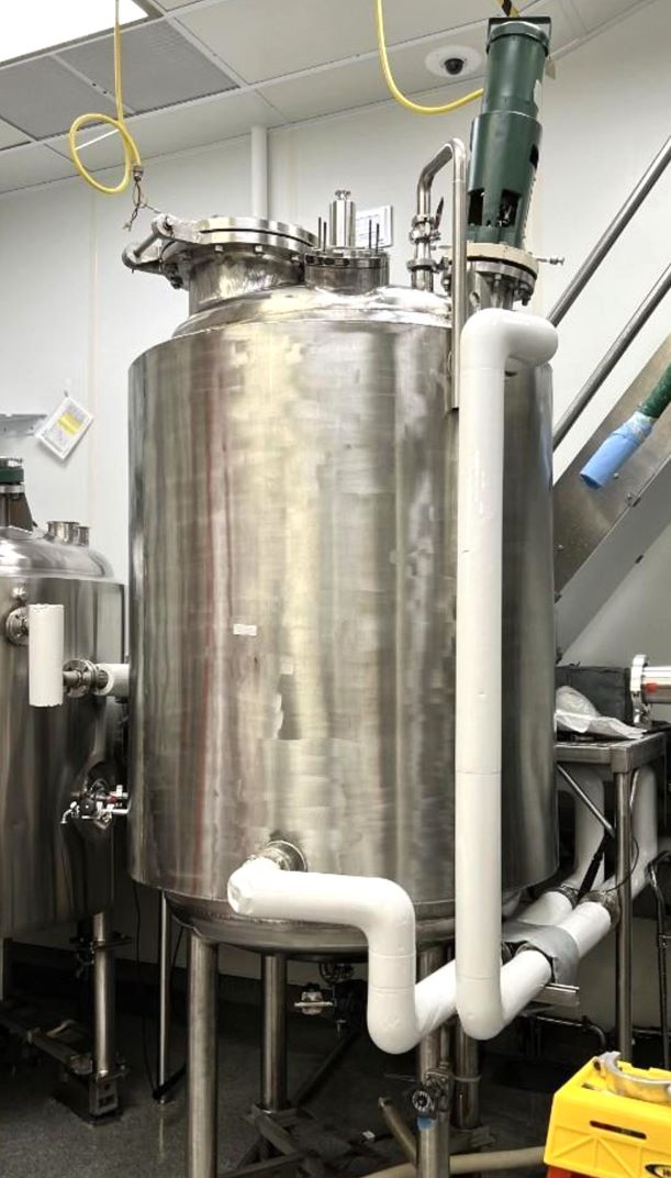 400 Gallon (1500 Liter) Hastelloy Jacketed Reactor with Mixer. Built by Youngstown Welding & Engineering. Internal rated 102 PSI @ 370 Deg.F..  Jacket rated 112 PSI @ 370 Deg.F. NB# 1924, S/N# 7645.01.  Top mounted Lightnin model XJSS87 Mixer.  Last used in sanitary pharmaceutical application.  