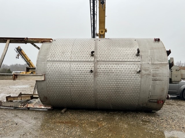 Used 10000 Gallon Stainless Steel Jacketed Mixing Tank. Dish Bottom. Flat Top. Jacket rated 150 PSI @ 365 Deg.F. Built by Perry.  Approx. 10'6