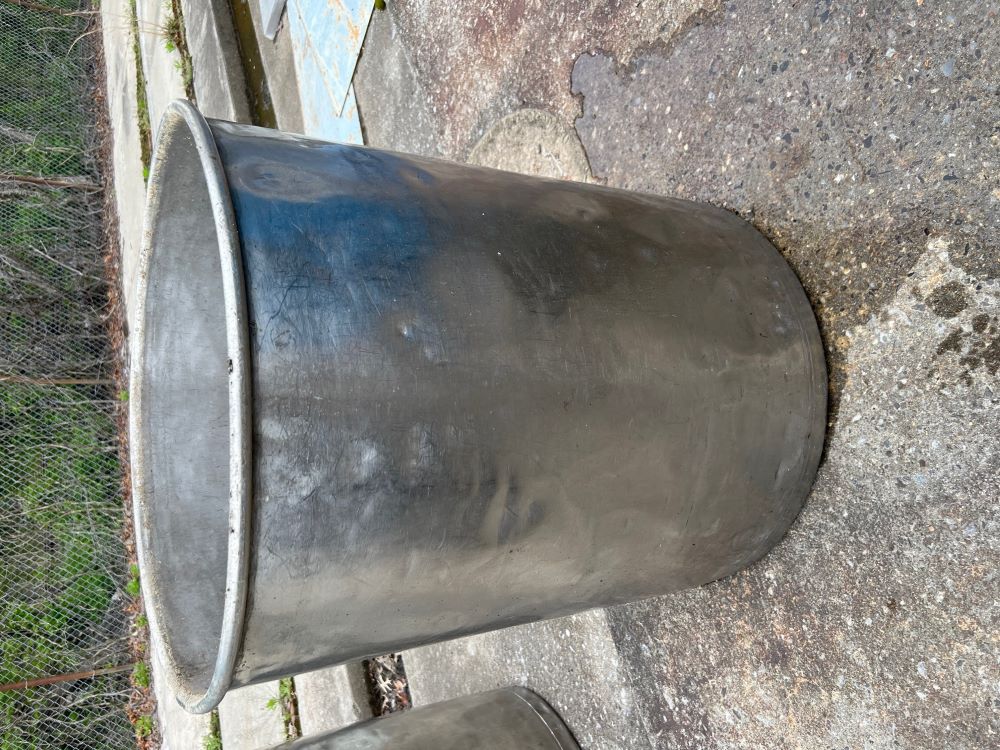 (10) 55 Gallon Stainless Steel Drum.