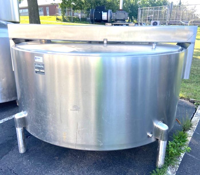 1000 Gallon Perma-San Stainless Steel Jacketed Mix Tank. Jacket rated 50 PSI @ 300 Deg.F.. Top mounted mixer with 4-Prop Agitation 1 HP, 1725 RPM, 115-208/230 volt with 20:1 reducer.   Approx. 7'6