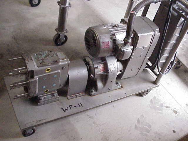 (1) Stainless Steel, rotary lobe, Waukesha Sanitary Pump.  Size 60.  Vari-drive (varible speed) motor, 3 HP, 230/460 V, 1730 RPMi, 48 - 483 RPMo, ratio 9.32:1.  Has Allen Bradley XP (explosion proof) control panel.  Portable on wheels.  Missing head.  (can be sold in parts, Waukesha Parts)