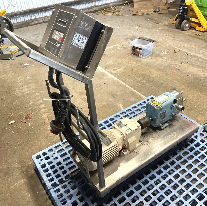 ***SOLD*** used Waukesha Cherry-Burrell Positive Displacement Pump Model 018U2 rotary lobe pump.  Mounted on portable stainless Steel base with vari-speed controller. 0.029 Gal. (0.110 Liter).  Nominal 20 GPM. 