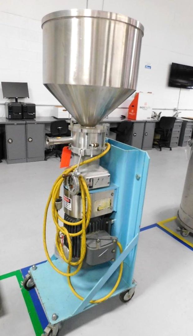 GREERCO Model W500V In-Line Colloid Mill. Vertically mounted. Has stainless steel adjustable rotor/stator.  Inlet hopper.  Portable, on wheels/casters. 10 HP.  Last used in Sanitary Pharmaceutical application.